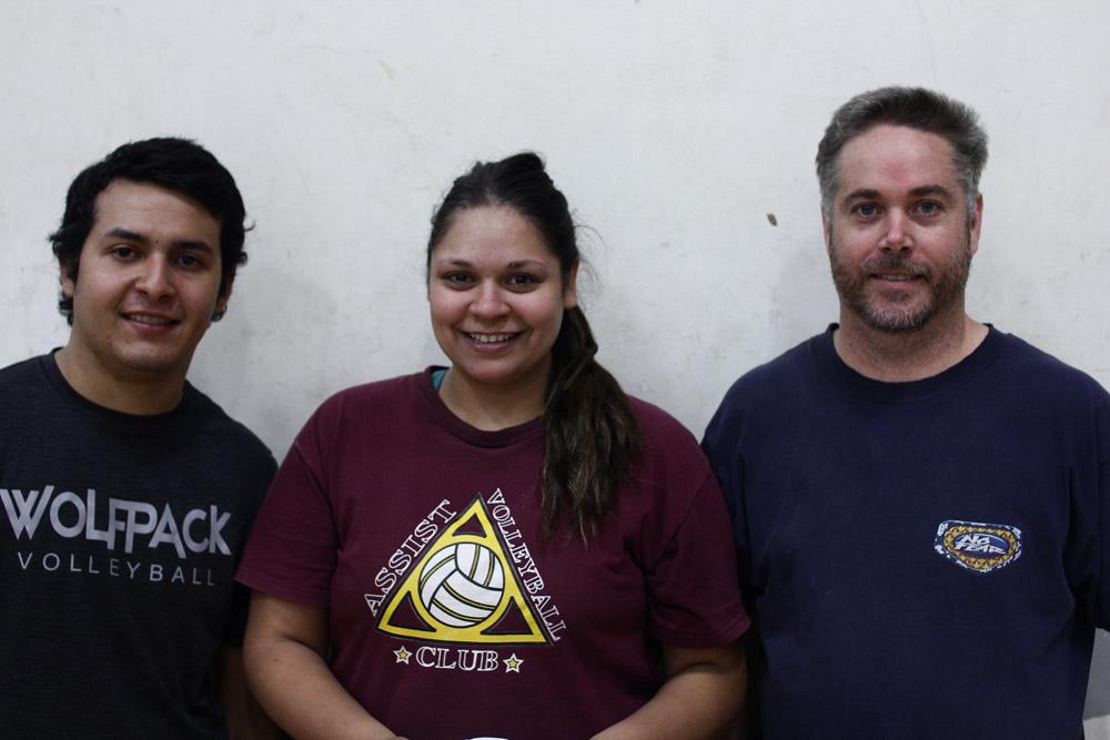 From left to right: New CHS volleyball coaches Mainor Ramos, Kate Daniels, and Alan Comerford pose together.