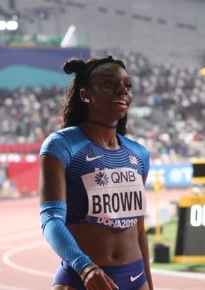 Brittany Brown catches her breath and glances at the billboard moments after her silver medal performance in the Women’s 200 m Finals at IAAF World
Championships of
22.22 seconds.