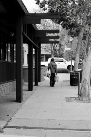 A member of Claremont's homeless population roams the streets in search of food and a place to rest.