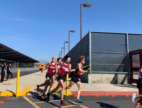 Cross-country runners round a turn during their dual meet against Bonita High School on March 6.