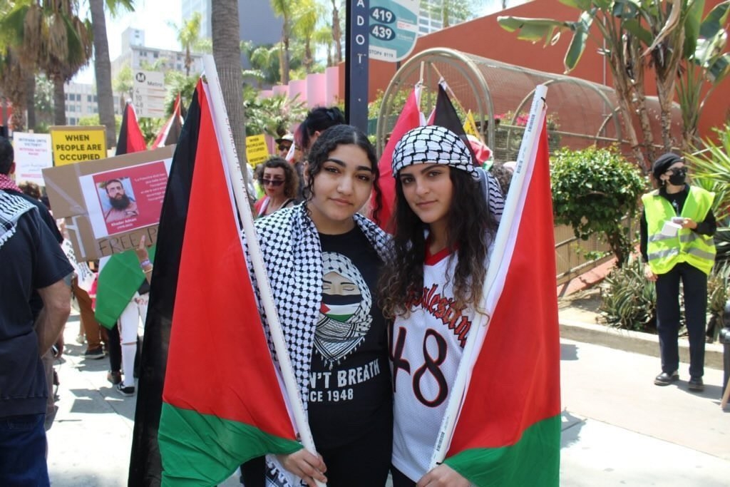 Noor Abdallah (left), a CHS alumna from the class of 2023, protesting alongside hundreds.
Photo courtesy of Noor Abdallah