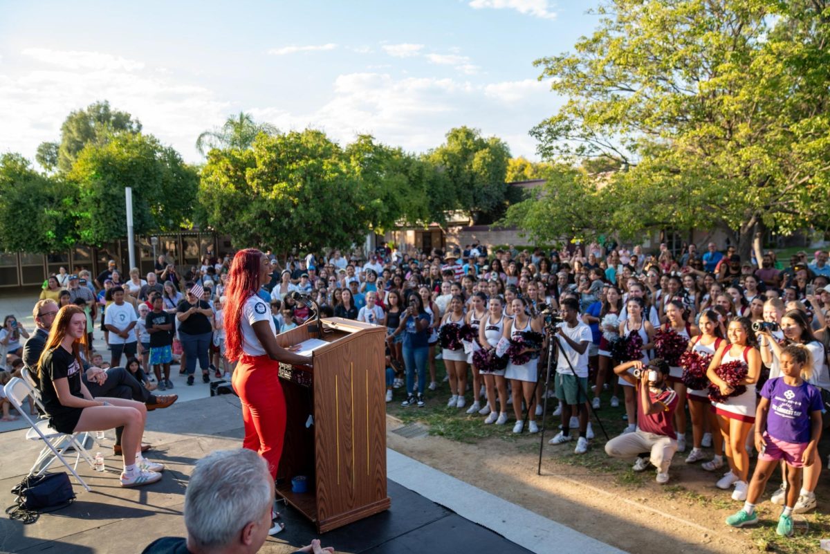 Brittany Brown addressing the crowd at CHS after a parade in her honor through Claremont on October 2.